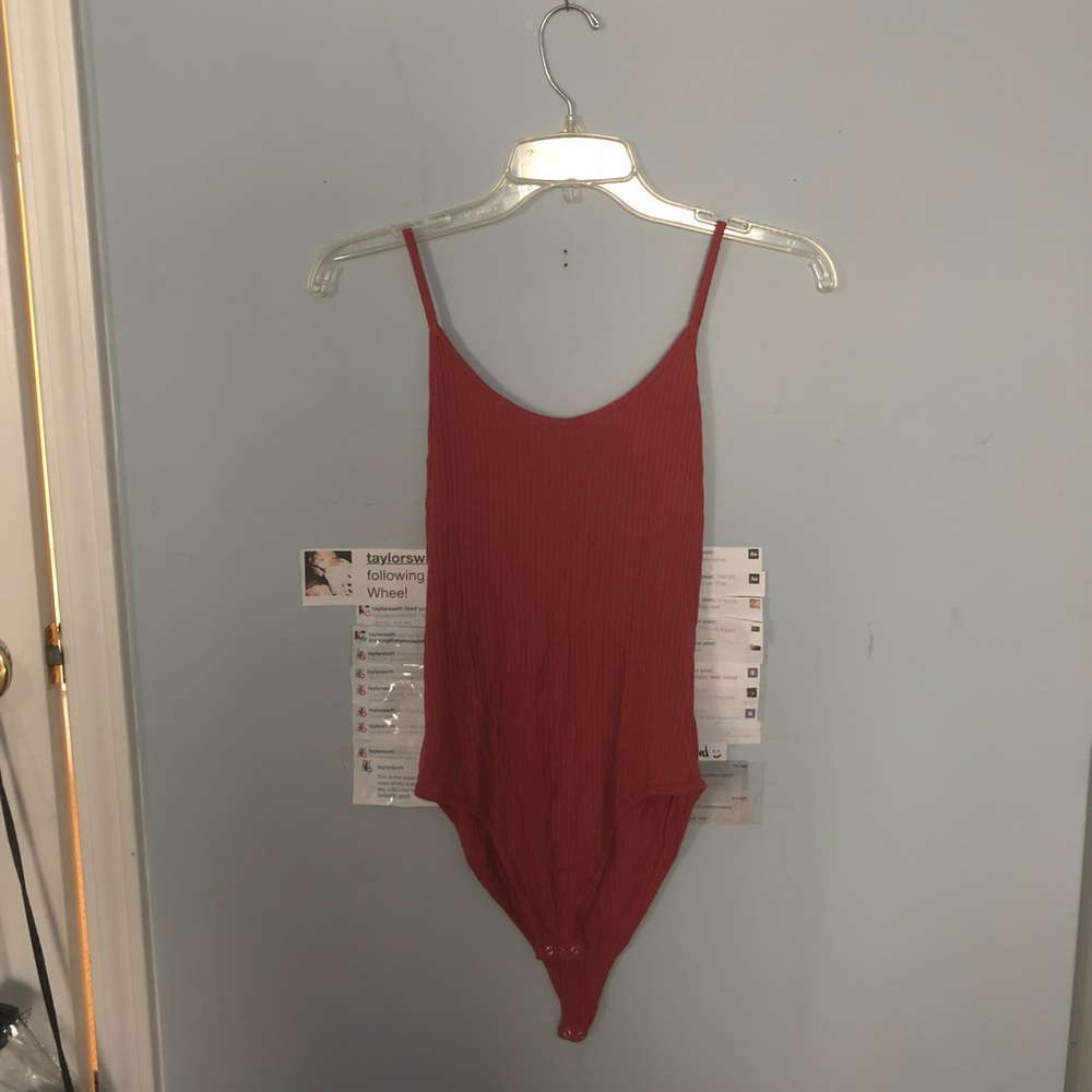 orange bodysuit